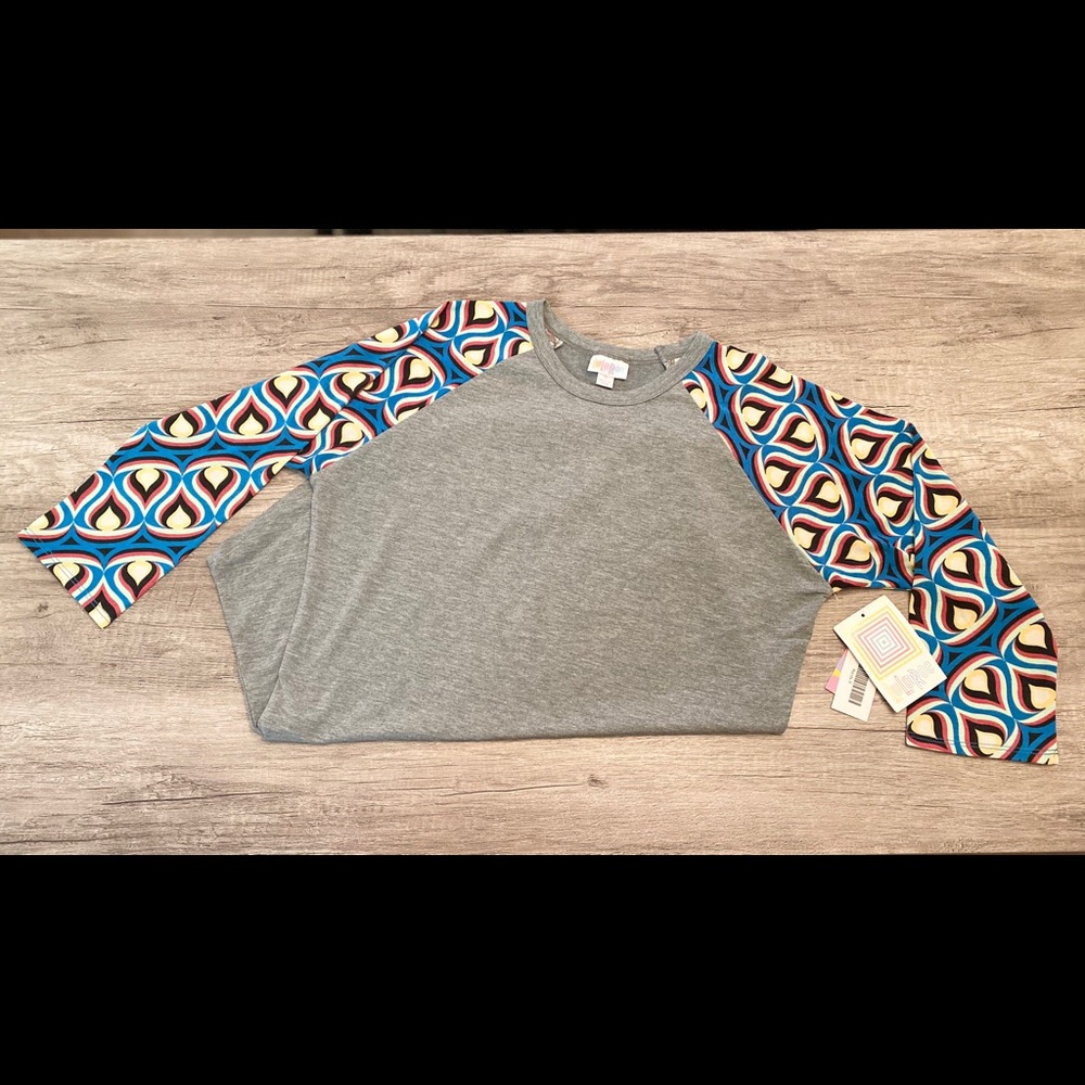 LulaRoe Randy half sleeve shirt!💜